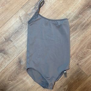 Skims one shoulder smooth body suit